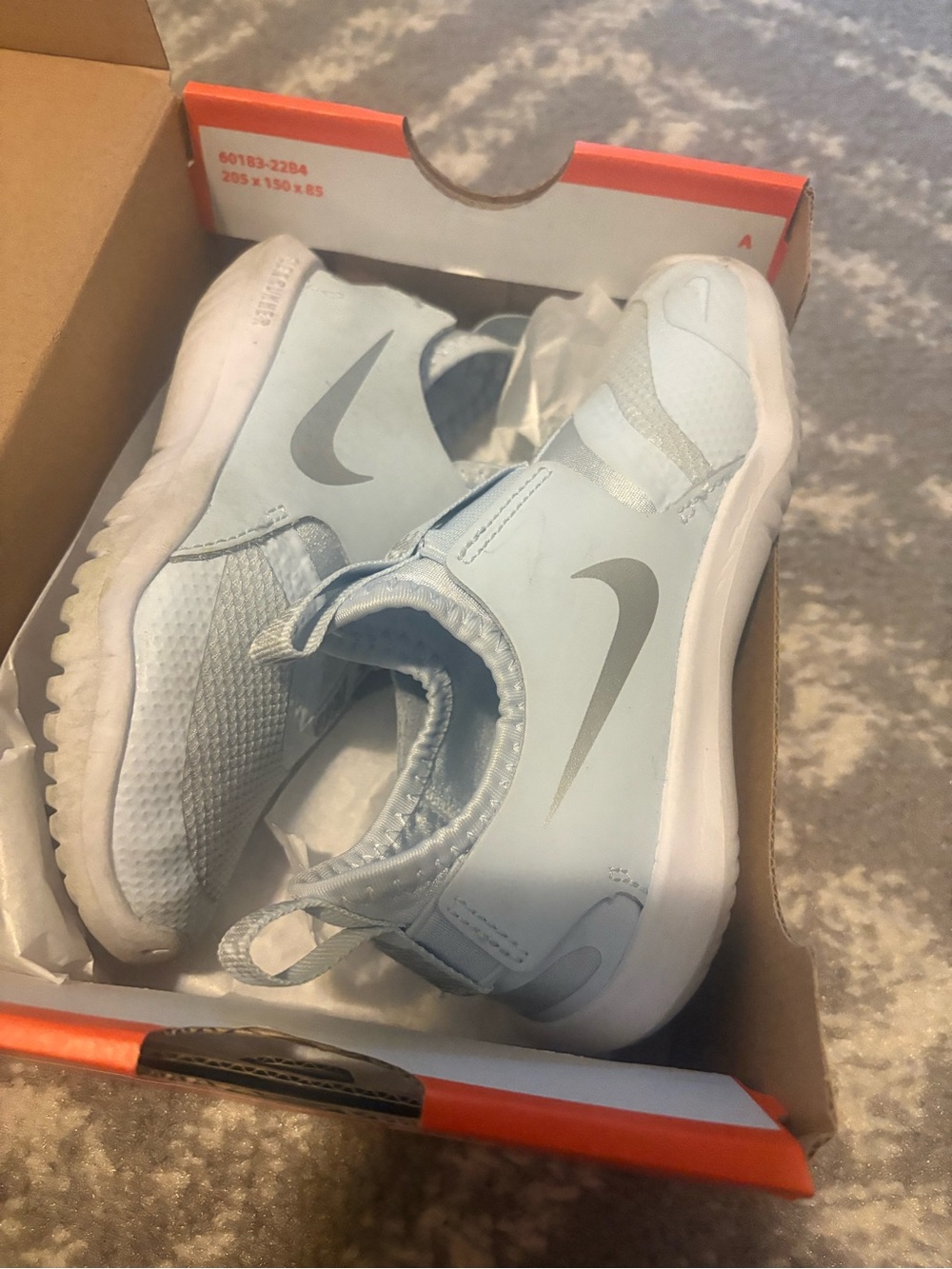 Nike Kids Light Blue Slip-On Sneakers with Silver Swoosh